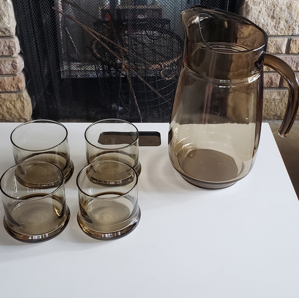 Set of 4 heavy footed amber rocks glasses and pitcher set